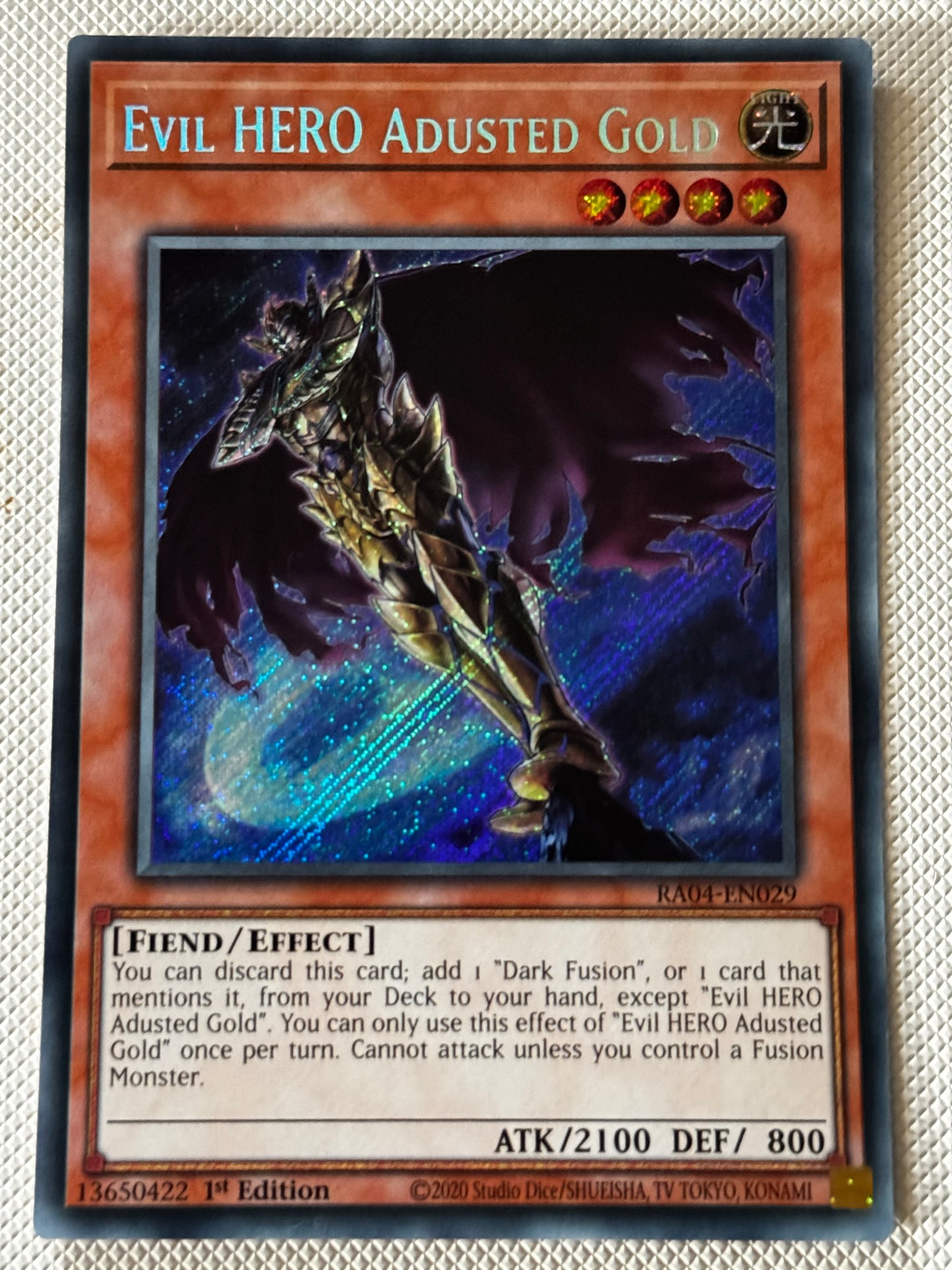 Evil HERO Adusted Gold RA04-EN029