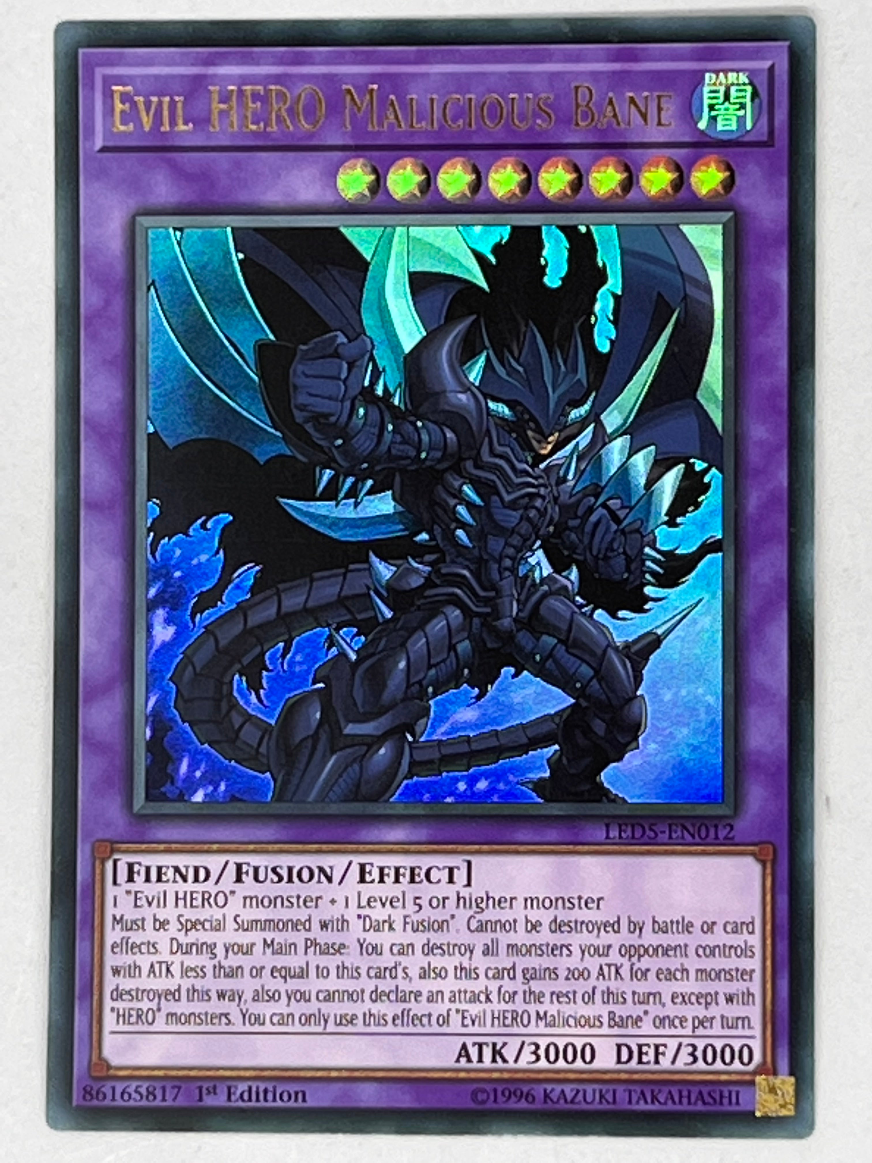 Evil HERO Malicious Bane LED5-EN012 – Genesis TCG